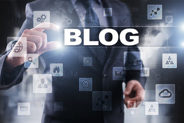 Businessman selecting blog on virtual screen.