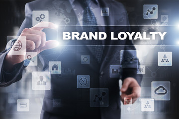 Fototapeta na wymiar Businessman selecting brand loyalty on virtual screen.