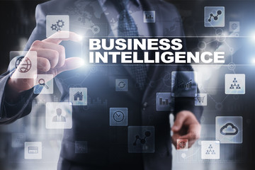 Fototapeta na wymiar Businessman selecting business intelligence on virtual screen.
