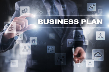 Fototapeta na wymiar Businessman selecting business plan on virtual screen.