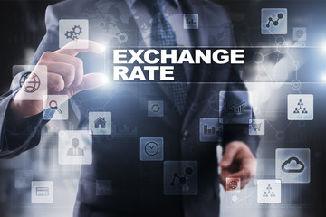Businessman selecting exchange rate on virtual screen.