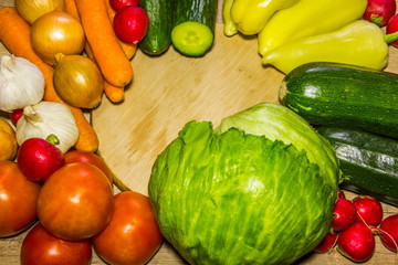 Healthy Organic Vegetables on a wooden Background