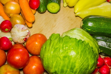 Healthy Organic Vegetables on a wooden Background