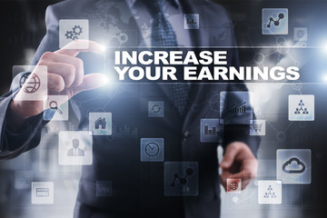 Businessman selecting increase your earnings on virtual screen.