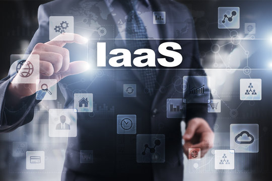 Businessman selecting iaas on virtual screen.