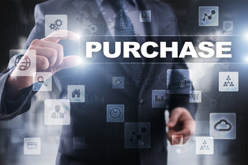 Businessman selecting purchase on virtual screen.