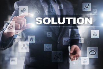 Businessman selecting solution on virtual screen.