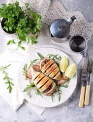 Baked squid stuffed with onions, carrots and mushrooms