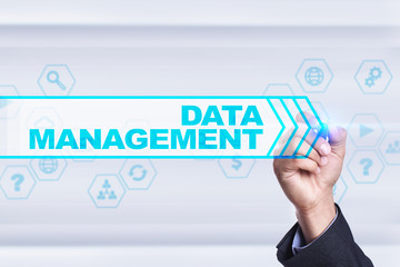 Fototapeta premium Businessman drawing on virtual screen. data management concept.