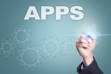 Businessman drawing on virtual screen. apps concept