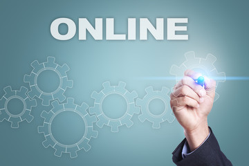 Businessman drawing on virtual screen. online concept