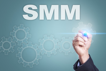 Businessman drawing on virtual screen. smm concept