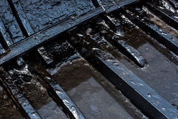 Tarred boat hull background, Varanasi, India © guyberresford