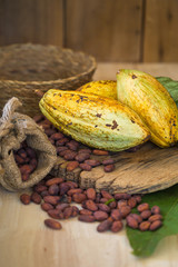 Cacao fruit, raw cacao beans, Cocoa pod on wooden background
