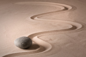 Fototapeta na wymiar Spirituality and harmony through zen meditation stone for focus on purity and relaxation. ..