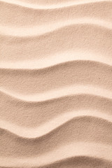 Fototapeta na wymiar ripples in sand on beach , texture background.