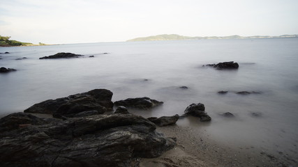 Wooden walkway bridge along the beach,Beach, rocky beach, beautiful beach, wooden bridges, wooden bridges along the beach, Koh Kham, Kham island, Sattahip, Chonburi, Thailand.