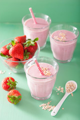 healthy strawberry oat smoothie in glass