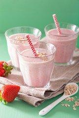 healthy strawberry oat smoothie in glass
