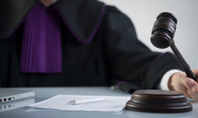 justice and law concept.  judge in a courtroom with the gavel,  