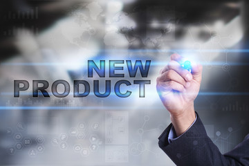 Businessman is drawing on virtual screen. new product concept.