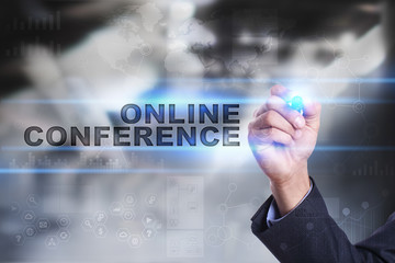 Businessman is drawing on virtual screen. online conference concept.