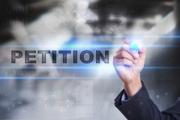 Businessman is drawing on virtual screen. petition concept.