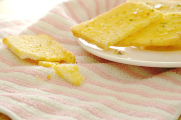 crispy butter garlic bread on plate