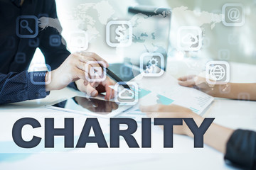 Fototapeta na wymiar charity on virtual screen. Business, technology and internet concept.