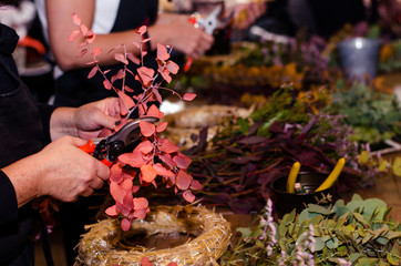 dried flowers and hands
