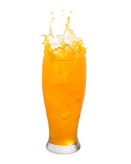 Splash of orange juice from the glass on a white background.