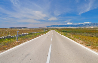 Scenic desert an endless road disappearing into the distance