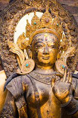 Close up of the statue of the river goddess Ganga standing on a Makara at Mul Chowk, Royal Palace in Patan, Nepal. The Ganga river is a holy river for Hindus.