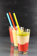 3 different smoothies with straws, low focus,