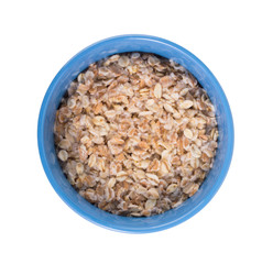 Oatmeal in a blue cup on a white background