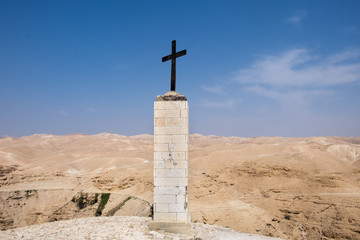 Cross pointing to St George Orthodox Monastery, located in Wadi Qelt, Israel