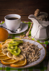 Breakfast concept. Oatmeal with fruit