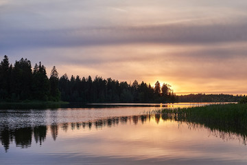 Fototapeta premium Peaceful summer sunset at the lake