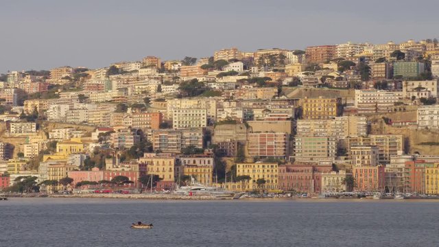 Fisherman and skyline in Naples, Italy 