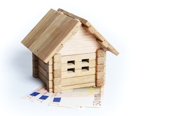 Wooden toy house and euro