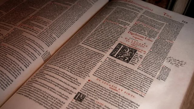 4K Video footage: Old Book with latin lettering from the 17th or 18th century
