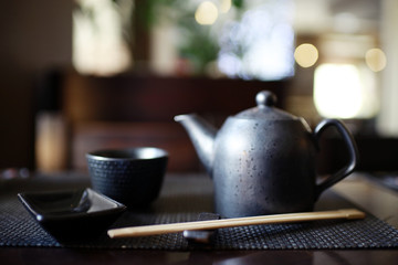 serving in eastern restaurant, sushi