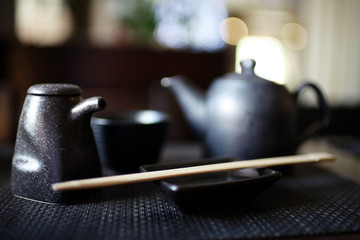 serving in eastern restaurant, sushi