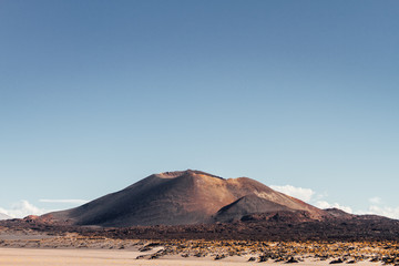 Antofagasta volcano with remains of slag among sand in Catamarca, Argentina
