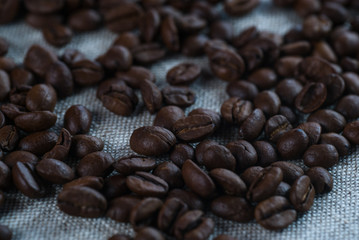 Coffee beans on wood background