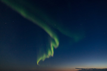 Naklejka na ściany i meble Aurora Borealis over the Barent Sea