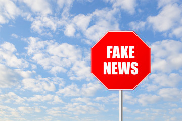 Stop fake news road sign