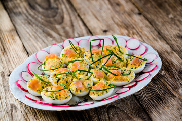 Stuffed eggs and potato salad 
