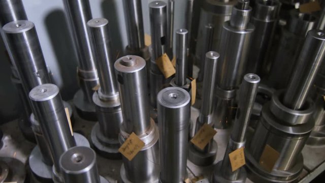 Motion Past Lines with Finished Compressor Pistons on Floor