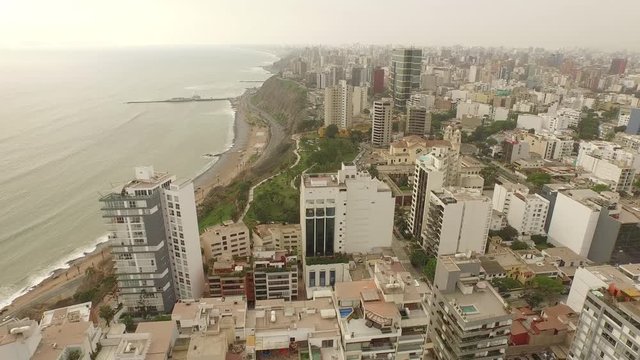 Aerial of the skyline of Lima with skyscrapers and the coastline. Peru,  South America, 